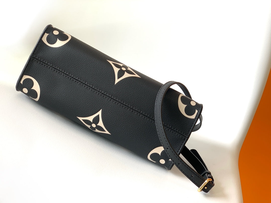 ONTHEGO TOTE 25 IN BLACK AND OFF WHITE MONOGRAM EMPREINTE