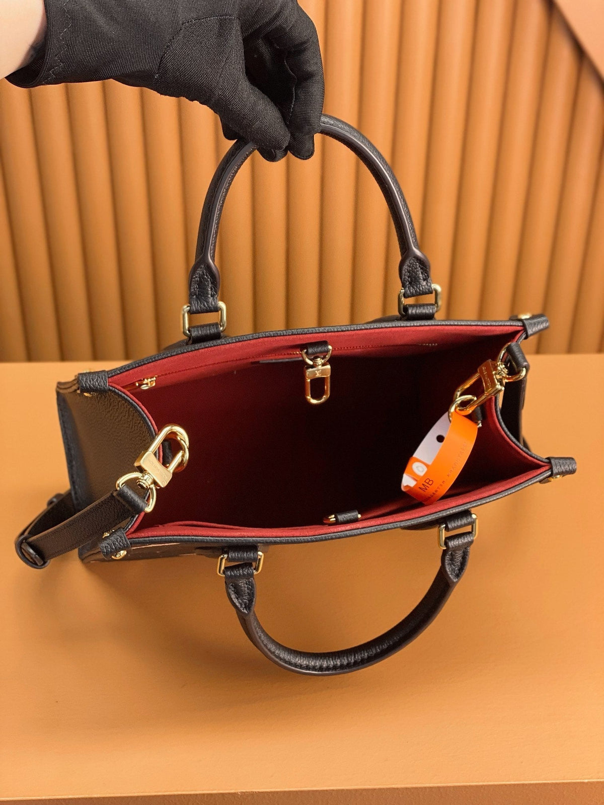 ONTHEGO TOTE 25 IN BLACK AND CREAM MONOGRAM EMPREINTE