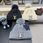 KNITTED BEANIE HAT IN BLACK WOOL AND LAMB FUR 430044