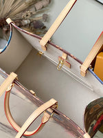 ONTHEGO VOYAGE 35 IN BROWN MONOGRAM CANVAS WITH VINTAGE HOTEL LABELS