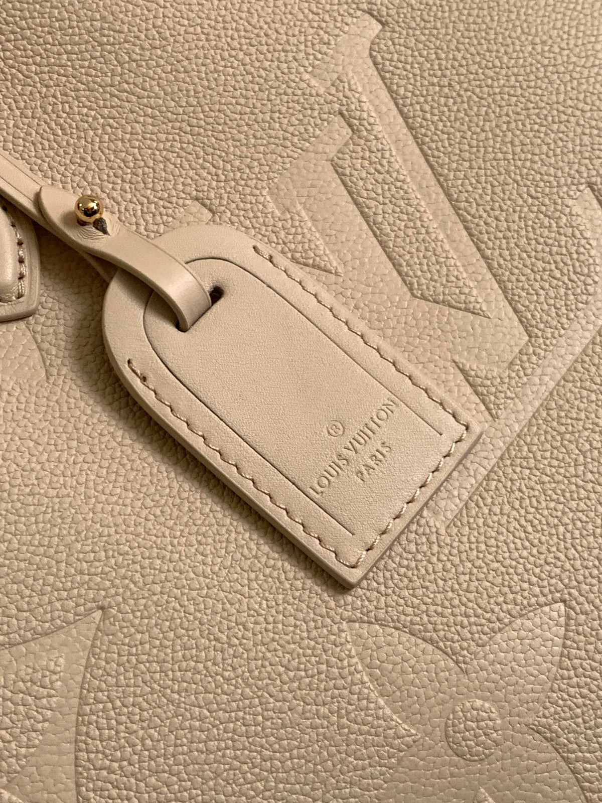 ONTHEGO 35 IN LIGHT BEIGE MONOGRAM CALFSKIN