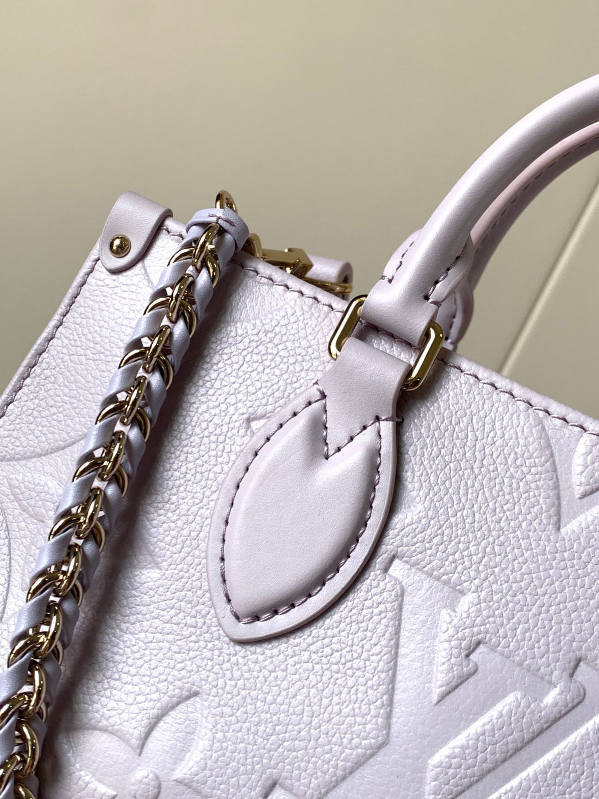 LV 25S ONTHEGO EAST WEST BAG 25 IN LIGHT LAVENDER CALFSKIN MONOGRAM EMPREINTE