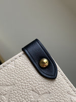 CRAFTY ONTHEGO GM 41 CREME BLACK MONOGRAM GIANT CANVAS