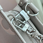 ONTHEGO EAST WEST BAG 25 IN BICOLOR MONOGRAM EMPREINTE LEATHER