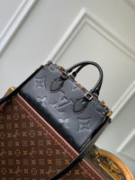 ONTHEGO EAST WEST BAG 25 IN BLACK MONOGRAM EMBOSSED COWHIDE