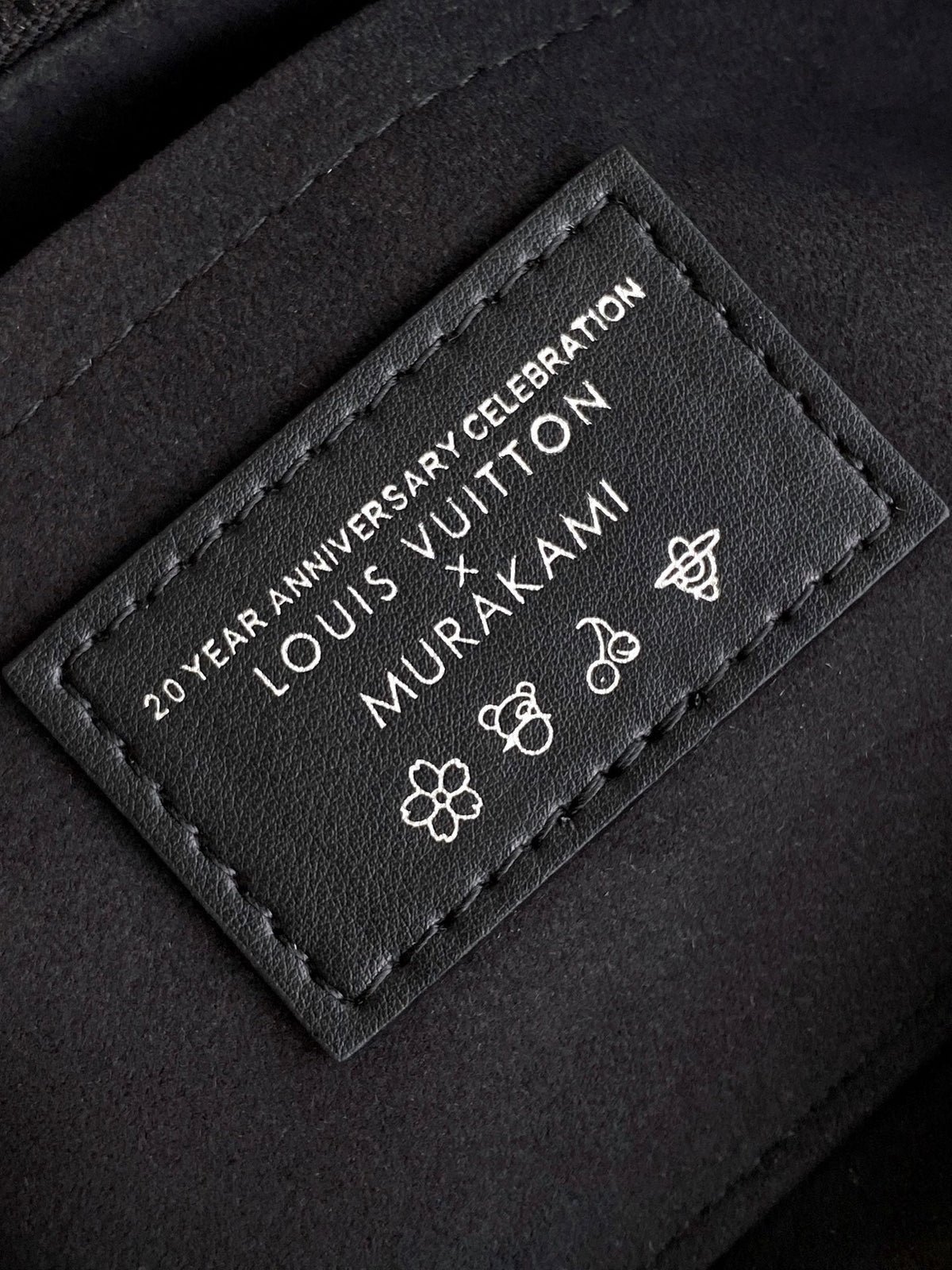 ONTHEGO EAST WEST BAG 25 IN COLORFUL MONOGRAM PATTERN CANVAS