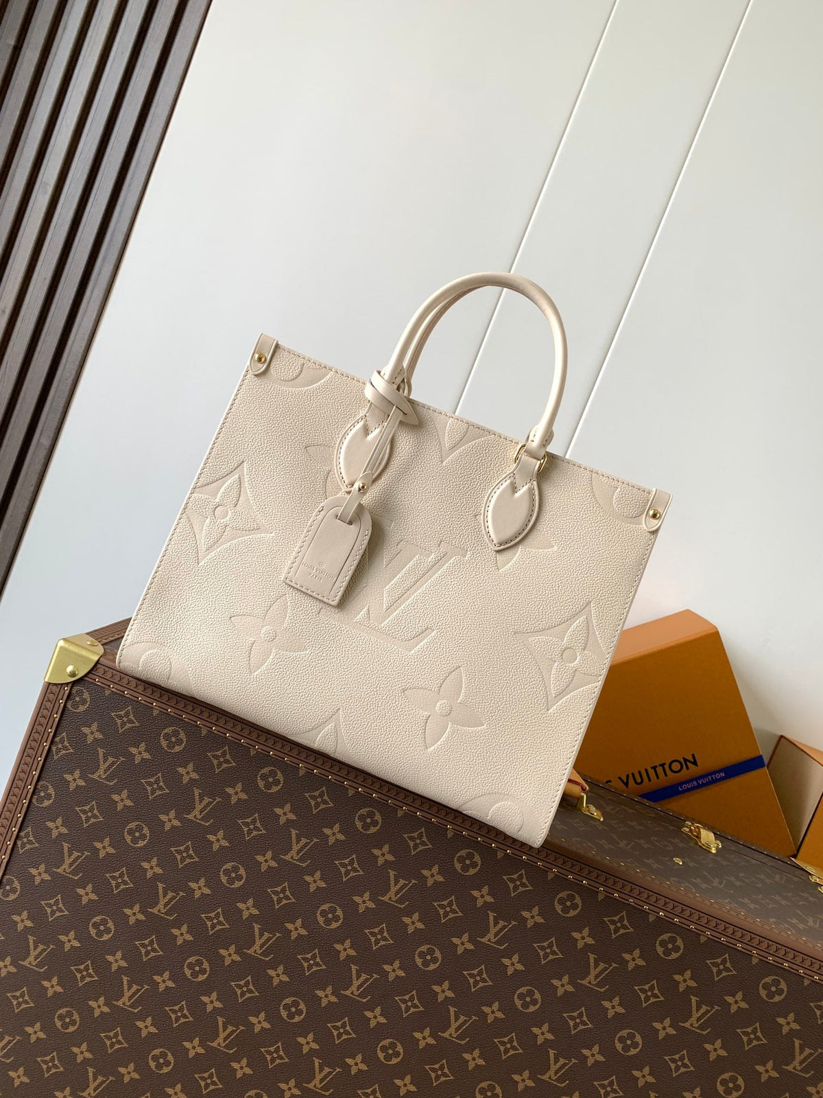 ONTHEGO 35 IN LIGHT BEIGE MONOGRAM CALFSKIN